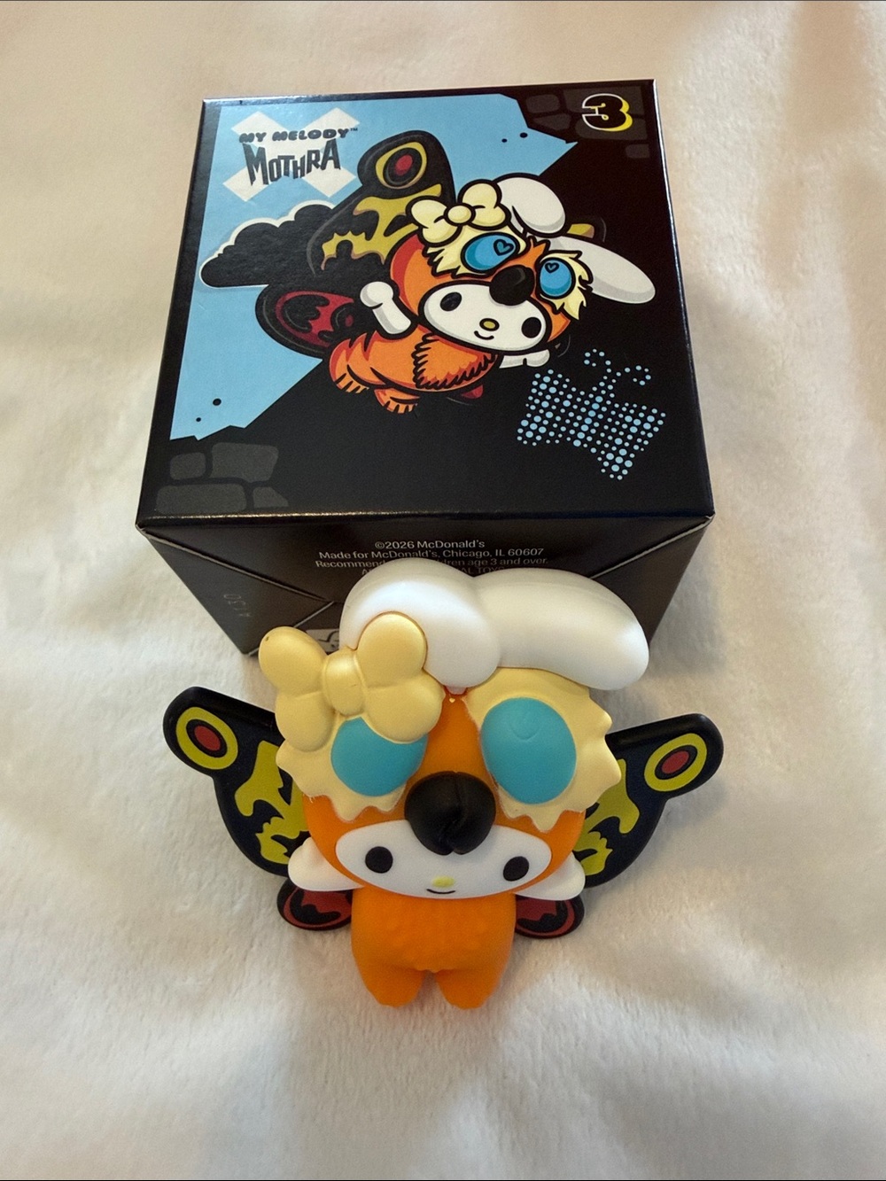 McDonald's My Melody Mothra Figure - Orange, White & Blue Accents